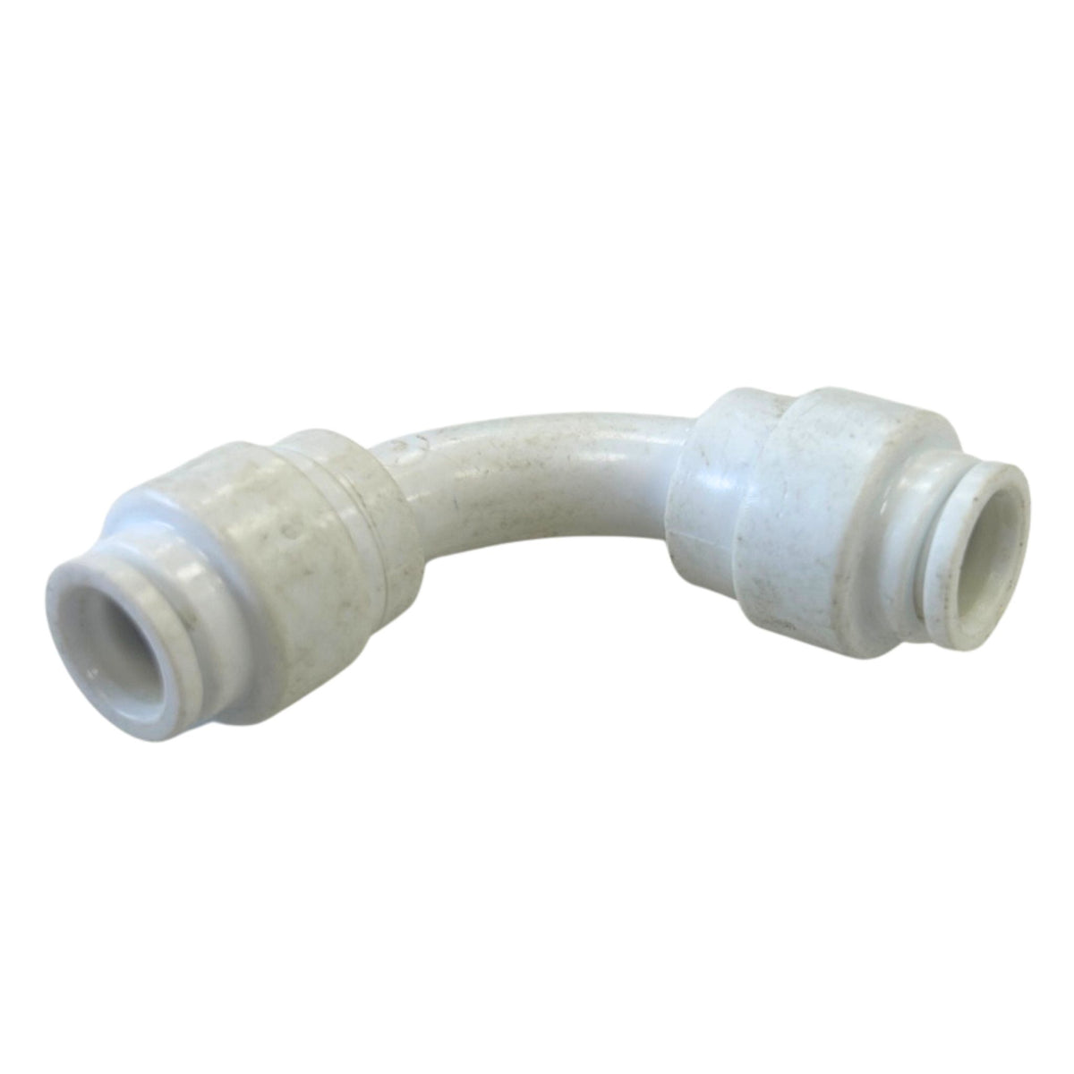 Close-up of white 5/16 inch swept flow elbow showing clearance condition